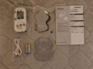 OMRON 低周波治療器 HV-F021 中身 取扱説明書 本体 コード パッド 収納器具